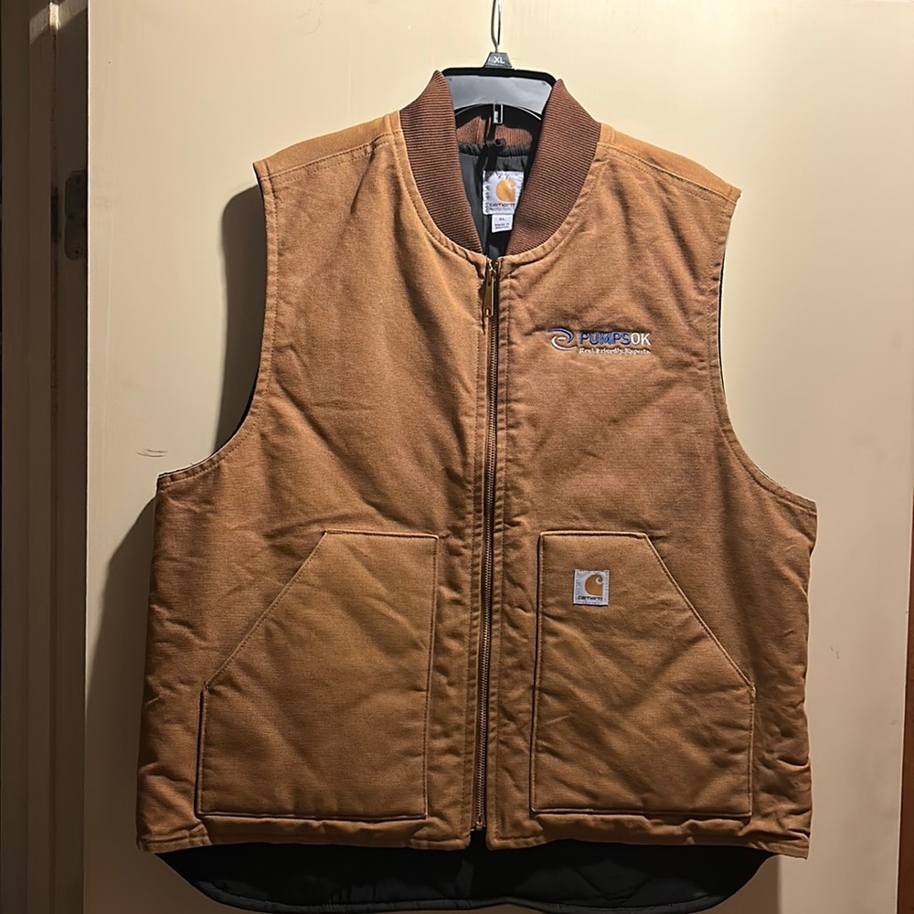 Like new Carhartt vest in original Carhartt brown , size XL , worn once or twice
